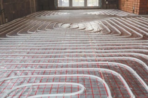 Pose et installation de plancher chauffant dans un appartement par artisan chauffagiste à Frangy